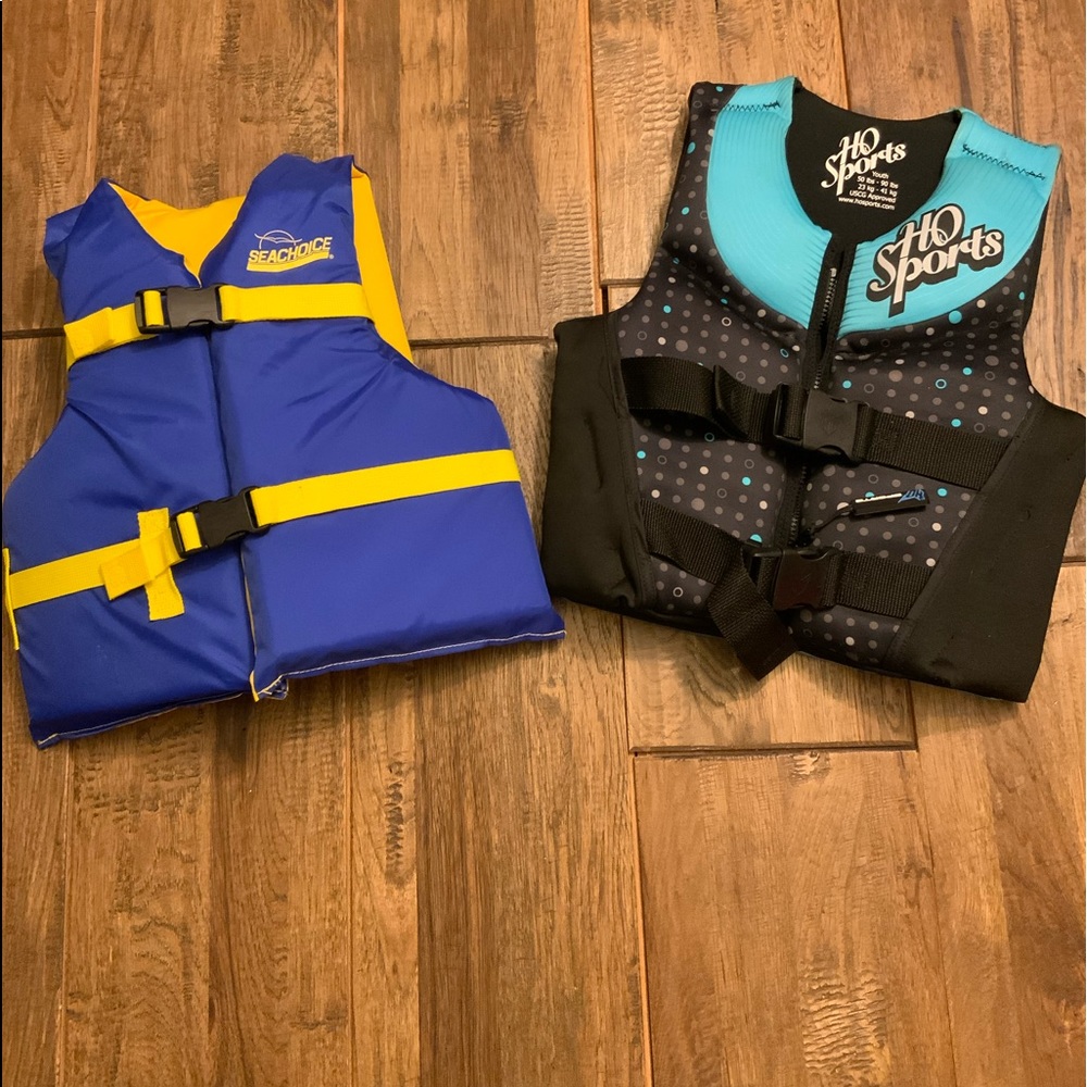 Youth life vest. Both fit 50-90 lbs.